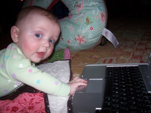 Stella, reviewing today's blog post. She's a stickler for accuracy.