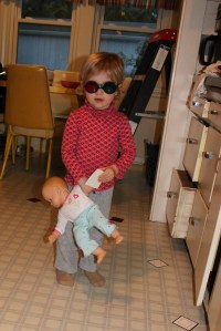 Stella, nailing "The Treat Game" with her assistant, named Baby.