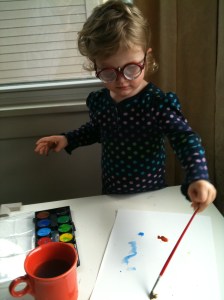 Artist at work, wearing yoked prism goggles